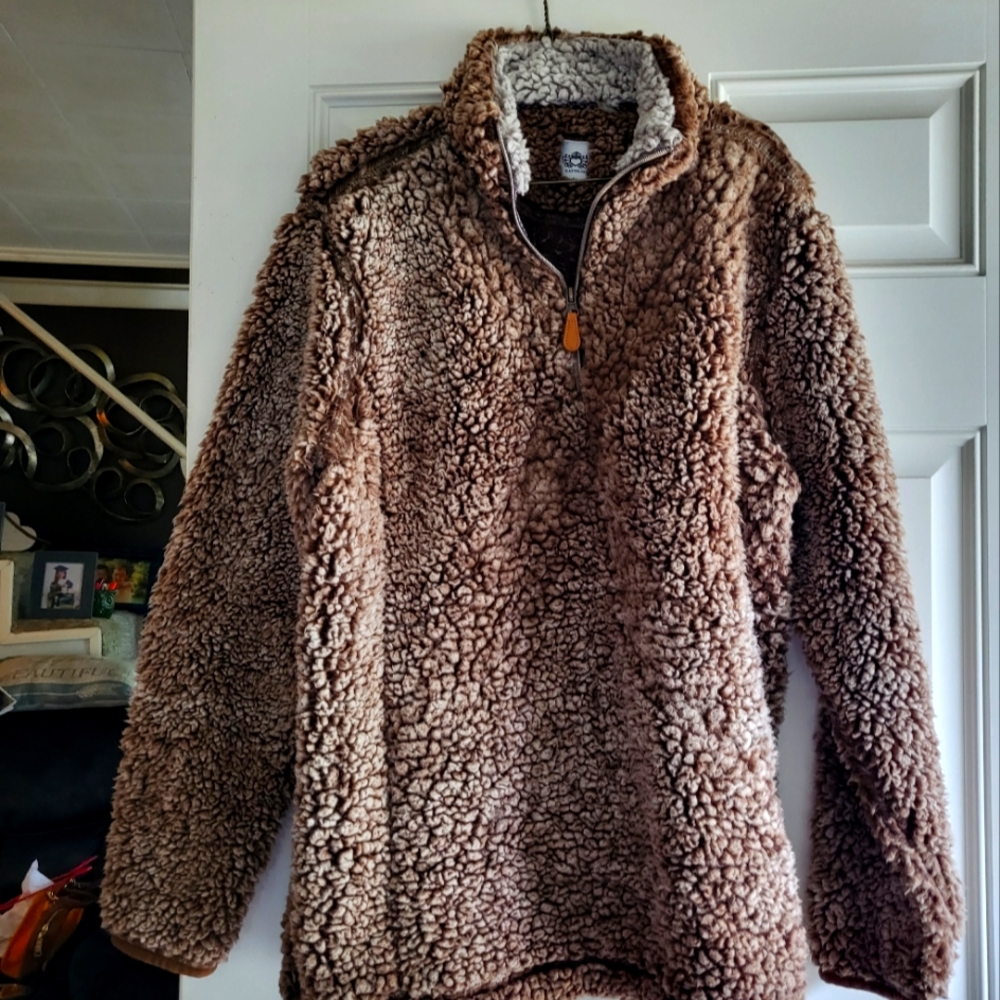 Used Pull over fuzzy sweater.